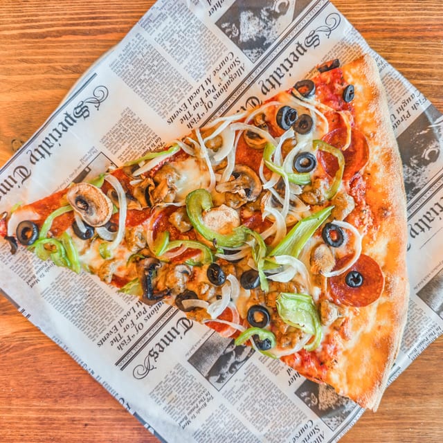 Supreme Pizza Slice.